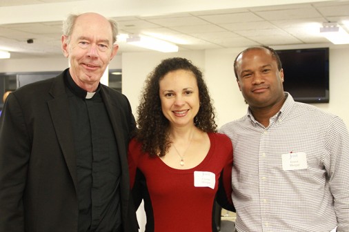 Jesuit president Fr. Anthony McGinn visits with Crystal and Ernest Morgan at the Parents of New Blue Jays reception in the Student Commons.