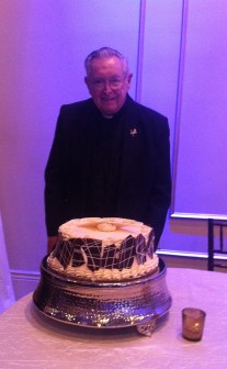 Fr. Norman O'Neal was surprised with a birthday cake by his colleagues at the End of the Year Faculty and Staff Party on Saturday, May 21.