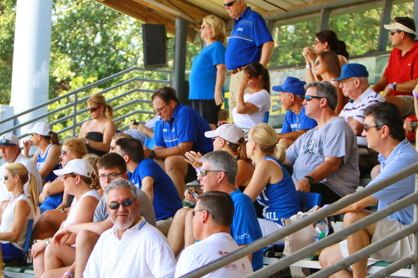 As the heat index swelled to triple digits, Retif fans find some respite in the shade of Kirsch-Rooney's grandstand during Saturday's doubleheader against Ponstein's.