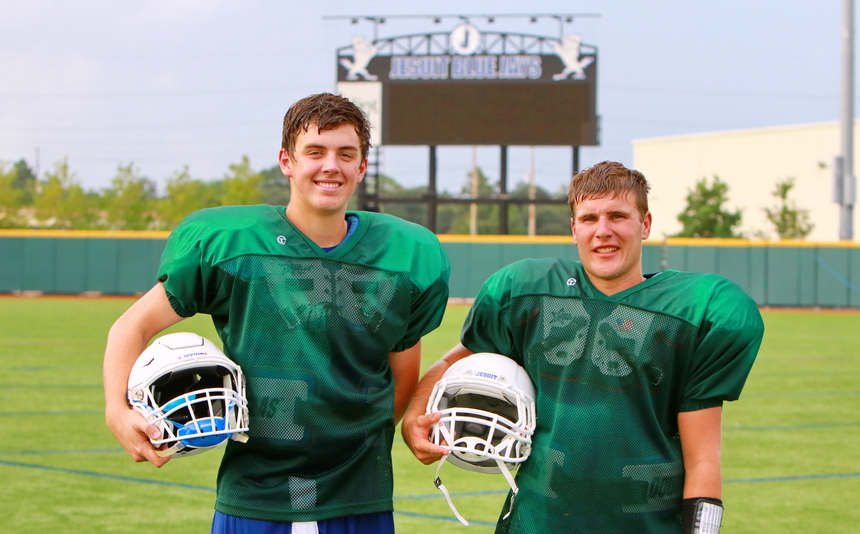 Junior Alex Watermeier (left) and senior Denny McGinnis are competing for a starting quarterback role.