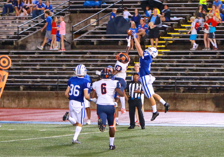 Ashton Loria leaps high to snag a 14-yard touchdown pass from quarterback Alex Watermeier to open the scoring for the Blue Jays against Escambia.