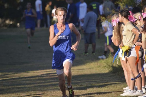 Senior Eli Sisung broke the 16-minute barrier to claim third place overall in the District 9-5A cross country meet on Tuesday, Oct. 25 at City Park.