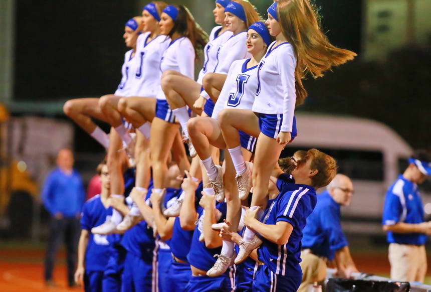 The Jesuit Cheerleaders "sock" it to the Blue Jay students and supporters at Joe Yenni Stadium.