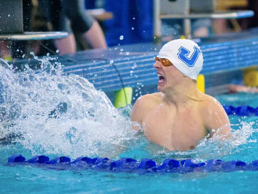 Noah Wilkins celebrates after winning the 50-yard freestyle event. (Photo by Rick Hickman/American Press)