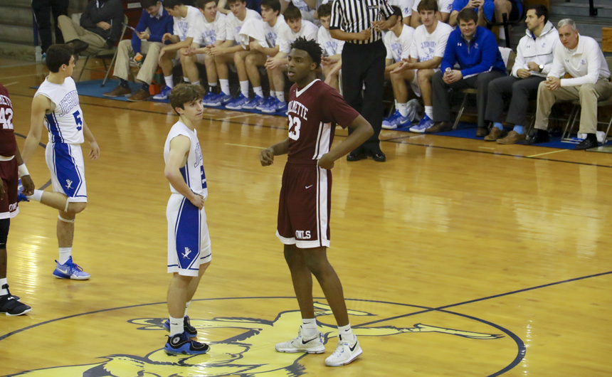 Will Hillery squares up to Mitchell Robinson for the tip off Thursday night in the Birdcage. 