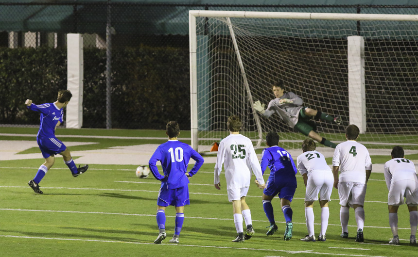 Junior Braden Brignac puts the only Blue Jay points on the board by slipping his shot past the Greenie goalie on this penalty kick.