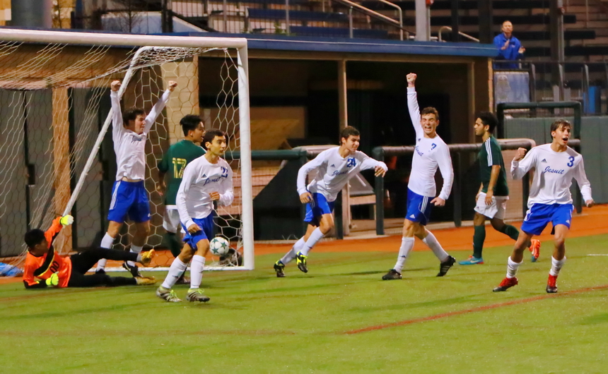 A free kick by Chris Tadros from the next parish gives the Jays a 1-0 win over Grace King  last Tuesday at John Ryan Stadium. Celebrating the goal are, from left, Braden Brignac, Jacob Torres, Colin Parenton, Chris Pitre, and Vincent Baumer.