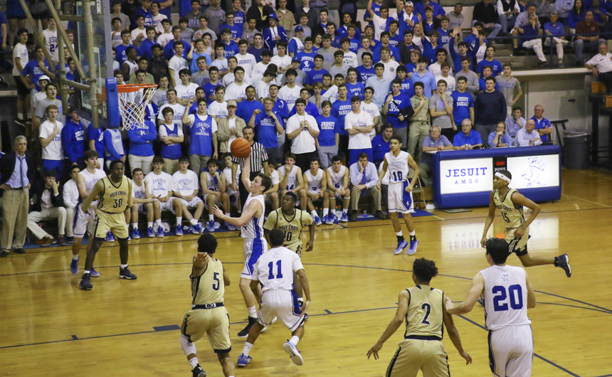 Chris Beebe rebounds his own shot for a put-back in the lane. Jesuit took the lead 41-40 with the play.