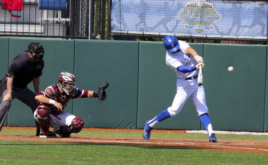 Senior Stephen Sepcich (27) connects on this drive to right field for a sixth inning triple.