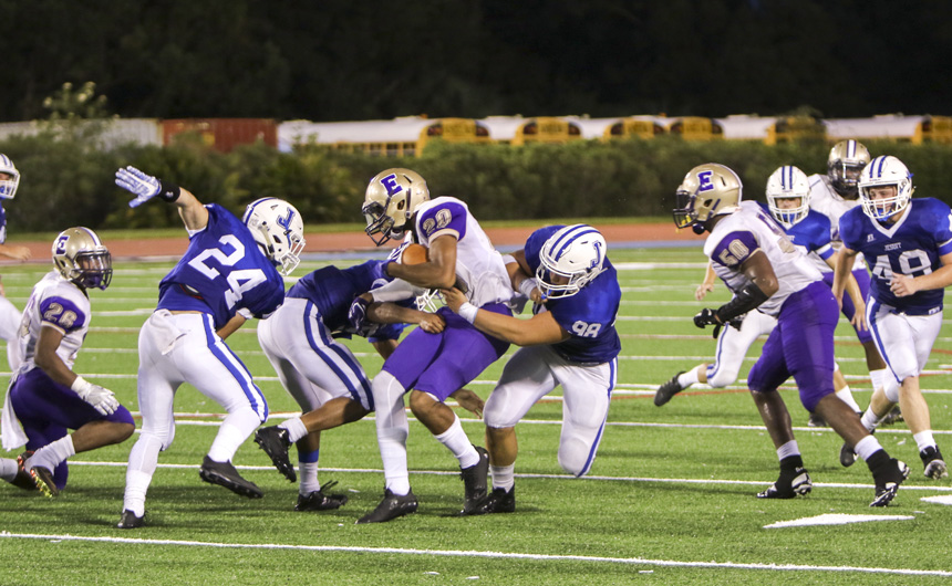 Lineman Perry Ganci displays perfect form on this tackle up the middle at the beginning of the second half.