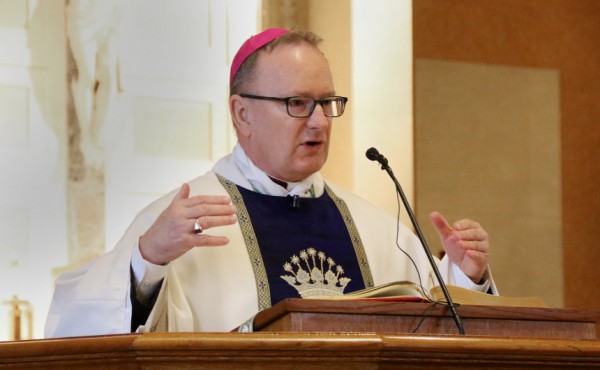 Bishop Michael Barber, S.J., peppered his homily with stories from his ministerial service with the armed forces.