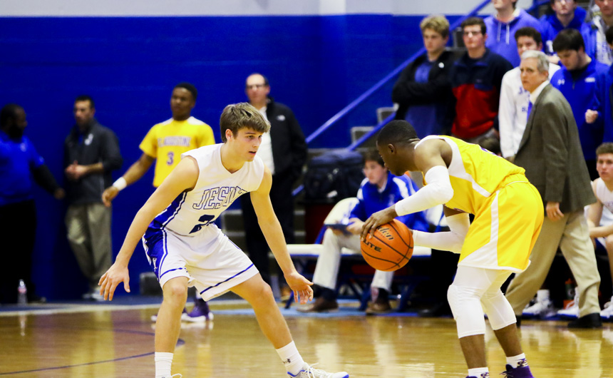 A “W” and a DeBlieux in Basketball District Opener
