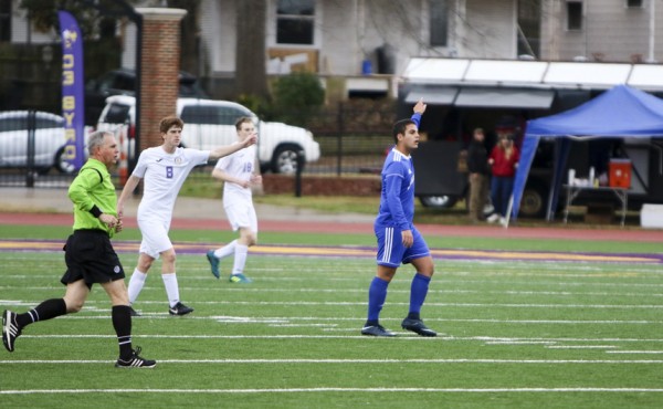 Junior Chris Tadros calls for a ball that would eventually lead to a free kick. Tadros hit the drilled free kick that avoided all defenders for Jesuit's first goal.
