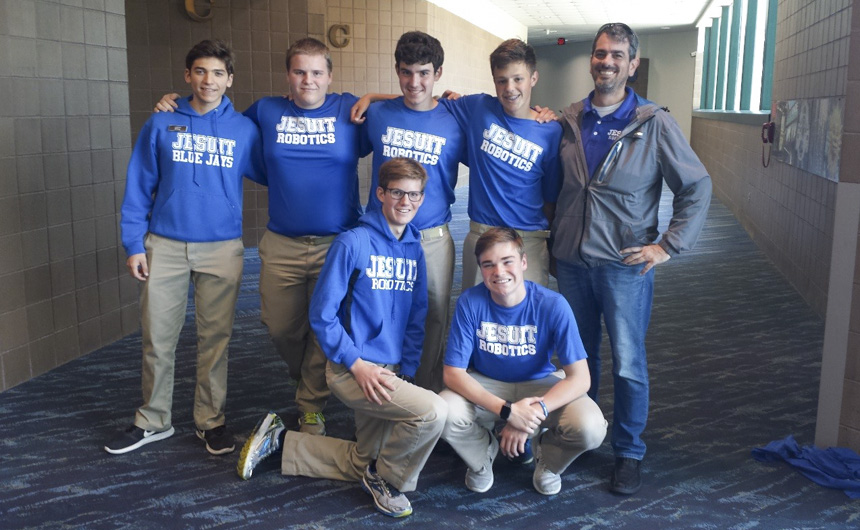 Robotics team members attending the 2018 Tulane Engineering Forum. Back row from left: Lucas Deane(2019), James Bragg(19), Emory Ducote(18), Alex Stapp(19), and Coach Mr. White. Front row from left: Reece deBoisblanc(19) and Hayes Martin(20).
